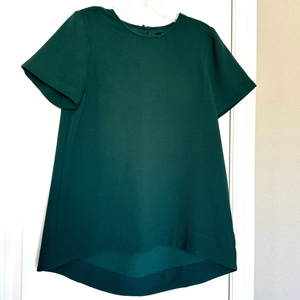 Madewell short sleeve blouse pleated back high low hem dark green.